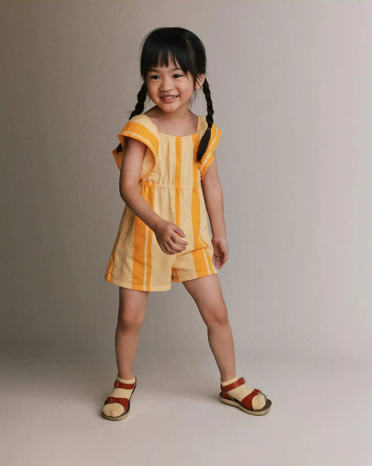 Toddler Girl Ruffle Sleeve Romper in Stripes - Yellow